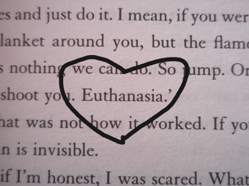 a picture of a page in a book with the word "Euthanasia" in focus, the word "Euthanasia" is messily circled as to demonstrate significance.