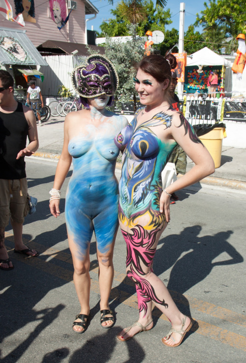 Two body painted girls nude at Fantasy Fest in 2013.