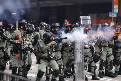 PHOTOS: Hong Kong protester shot and dozens arrested as Trump lauds China on National DayA pro-democ