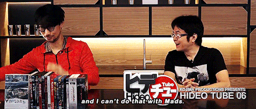 foyernormanchapel:Hideo magically summons Mads with his fanboy powers