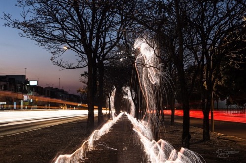 sixpenceee:  Energetic Light Paintings Highlight adult photos