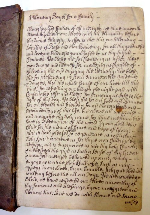 a manuscript prayer written on the paste down* of a religious book printed in 1702 - a fascinating p