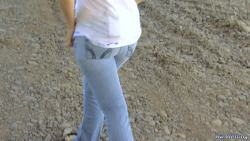 freefetishpics:  For this video we went to a beautiful, secluded, outdoor location near a river. Sosha desperately needed to pee. She had to go so bad that she ended up leaking a fair amount in her jeans on accident. Unable to hold it any longer, and