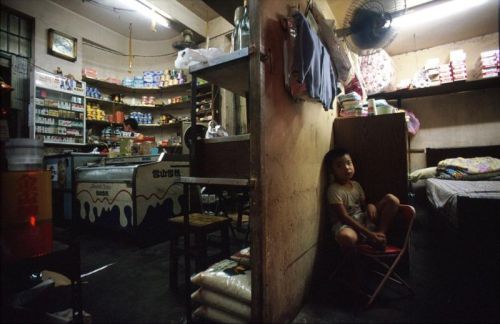 Impressive color photographs of Kowloon Walled City, once the most densely-populated place on Earth.