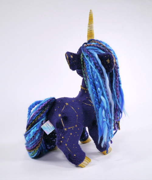 A celestial Unicorn I made is now up for adoption!  :D  I love the hand-painted stars on t