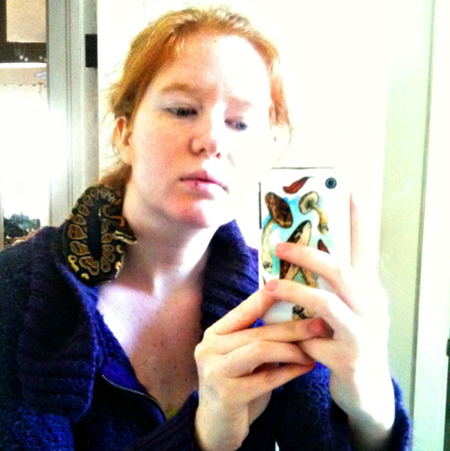 myself and our newest family member! he is a ball python belonging to Z and brings us up to a househ