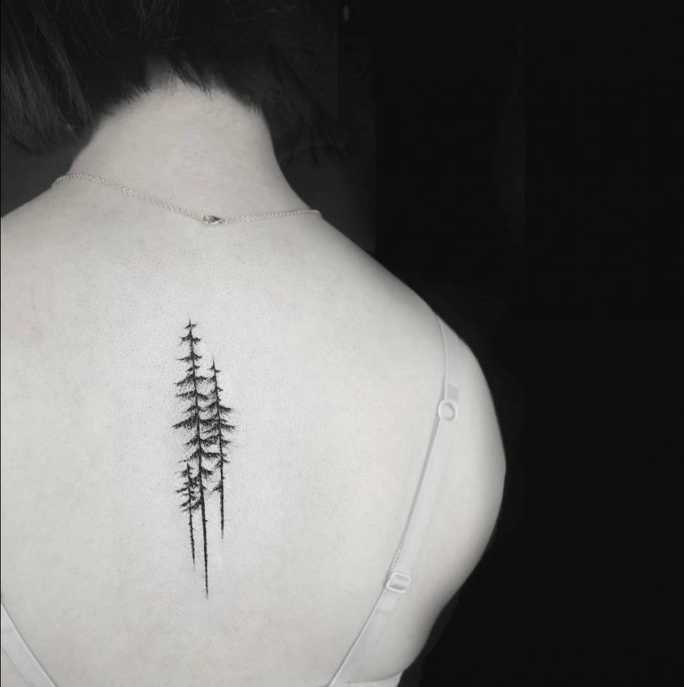 Little Tattoos — Pine trees on the upper back. Tattoo artist:...