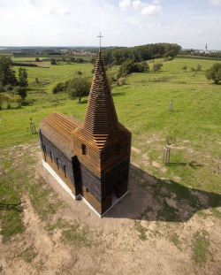 littlelimpstiff14u2: See Through, Transparent Church in Borgloon, Belgium The architect group, Gijs Van Vaerenbergh,  built this church in Borgloon, Belgium. It doesn’t look like anything  special… from certain angles. 	From other angles, the structure