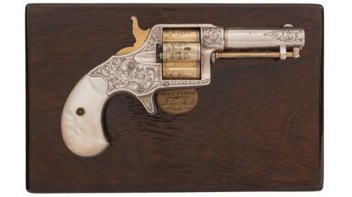 Cased and engraved Colt Cloverleaf single action revolver with pearl grips, produced between 1871 an