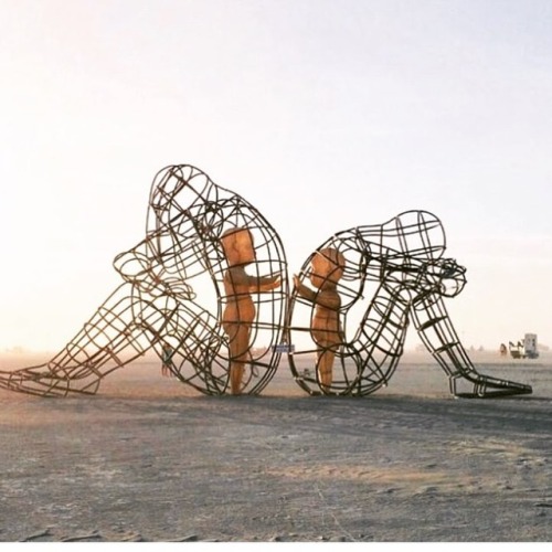 Powerful sculpture at Burning Man 2015 shows inner children trapped inside adult bodies. Inside each