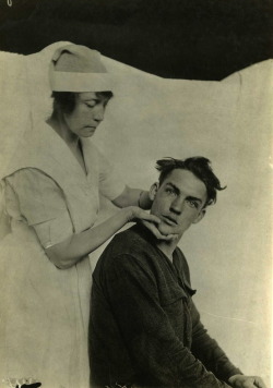death-suit:  Manipulation of contracted inter-vertebral ligament in cervical region. Physical therapy nurse at Walter Reed medical center 1916-17. (Archives National Museum Of Health and Medicine) 