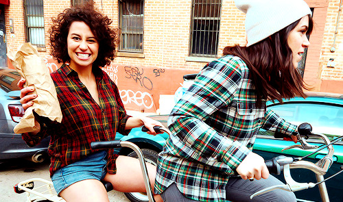 ilanawexler:  Abbi Jacobson and Ilana Glazer photographed by Peter Yang.  Omg riding tandem bikes, drinking forties…would be the best date ever.
