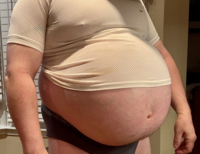 ballbellygainerbear:Medium football jersey that used to fit 🏈Help me feed and grow this fat bear gut: https://www.patreon.com/ballbellygainerbear