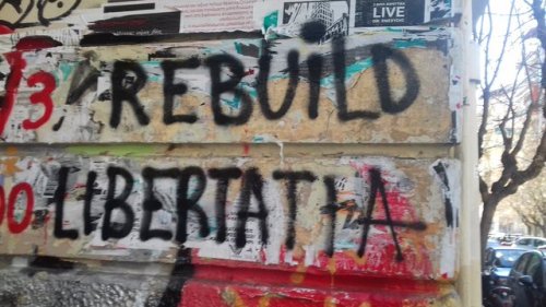 Solidarity graffiti for Libertatia, a squatted anarchist social centre in Thessaloniki, which was to