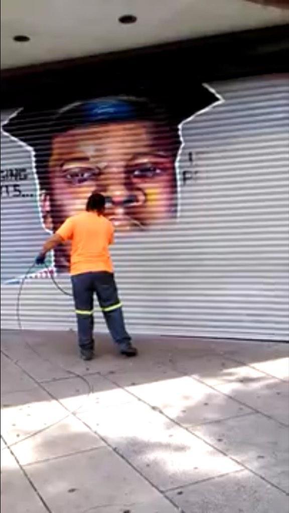 land-of-propaganda:  #FergusonOctober  A mural was painted over Monday afternoon