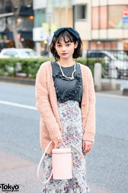 Tokyo street style personality Alice on the street in Harajuku wearing a retro inspired look with a 