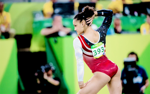 madikocian: Laurie Hernandez competes on the balance beam and floor exercise to help clinch USA to 