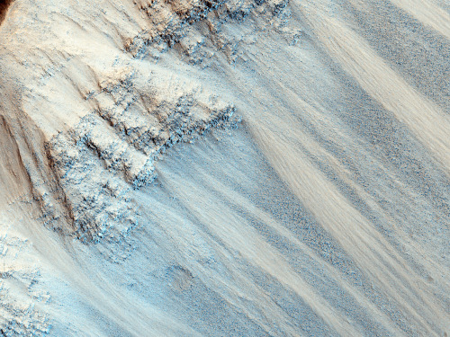 Slopes of a Crater in Terra Cimmeria (Mars), photo by Nasa