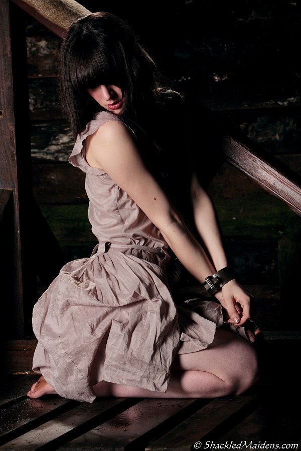 shackledmaidens-com:  &ldquo;October Cuffed to the Whipping Frame&rdquo;