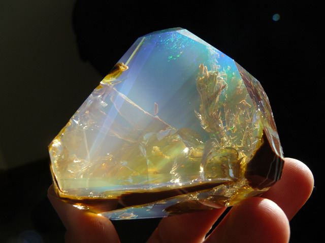 asylum-art:   Crystal Opal Looks Like a Handheld Aquarium by Inna Gem  Crystals