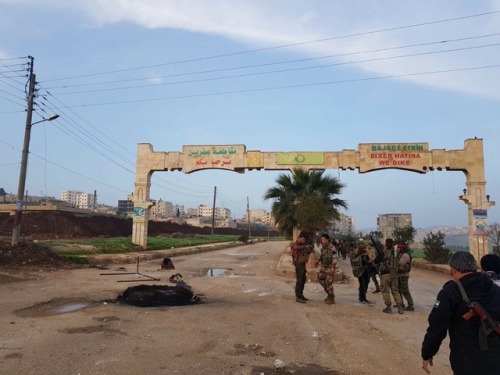 Turkish backed groups in the main entrance of Afrin.