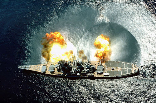 fuckyeah-nerdery:  The battleship Iowa (BB-61) firing a full broadside with its nine 16 inch and six 5 inch guns.LOOK AT THE FUCKING WATER. Holy Jesus shit fuck damn!