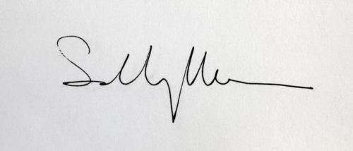 The signature of American Photographer: SALLY MANN….