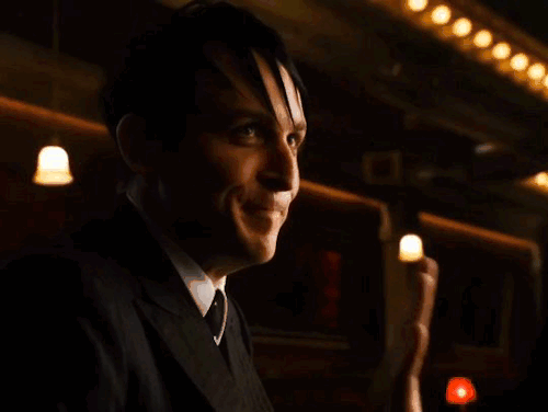 oswald holding up his hand, saying 'favor's done'.