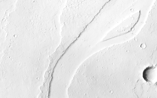 spacesource:Mars’ surface reveals the remnants of lava flows in the Tharsis region. x x