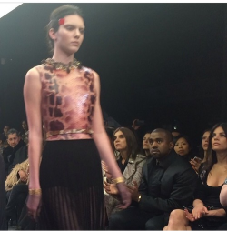 jenner-news:  Kanye watching Kendall walk the Givenchy show. 