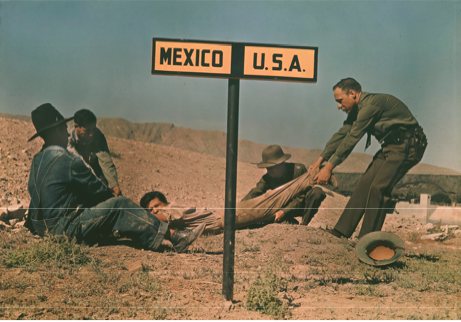 newyorker:  Two border-patrol officers attempt to keep a fugitive in the U.S. in this photo from National Geographic’s archive (Luis Marden/National Geographic). Click through to see more. 