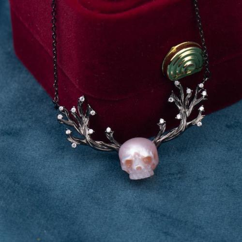 Porn Pics figdays:    skull carved pearl jewellery