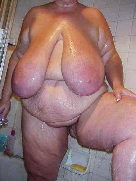 These are simply humongous old breasts, backed up by a nice fat belly, and huge cellulite