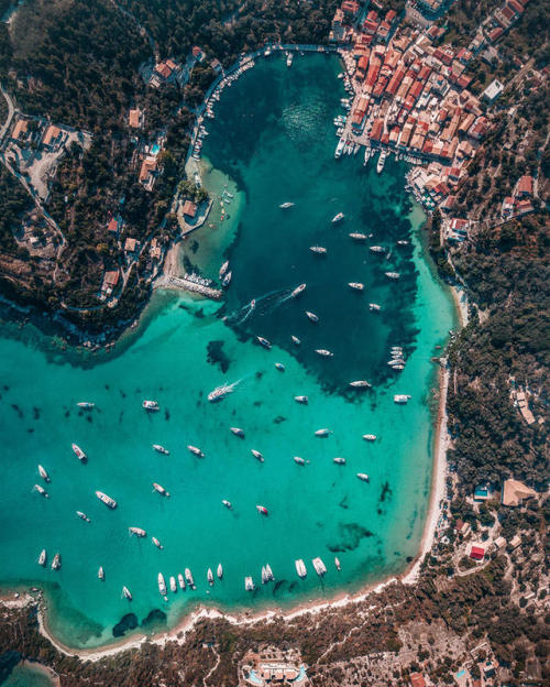 9 Greek Islands from Above by Dimitar KaranikolovThis one is in Paxós island but all his photos are 