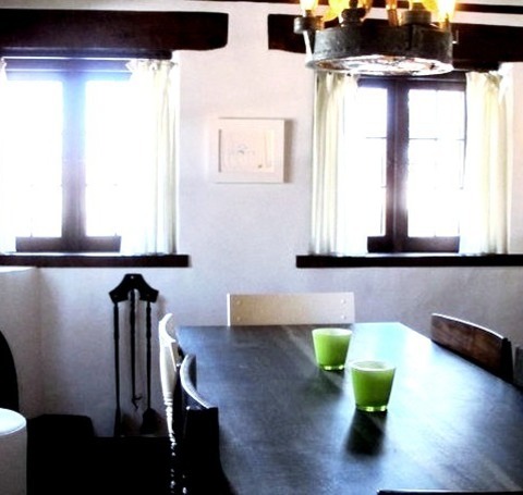 Enclosed In AlbuquerqueInspiration For A Mid-sized Southwestern Dark Wood Floor And Brown Floor Enclosed