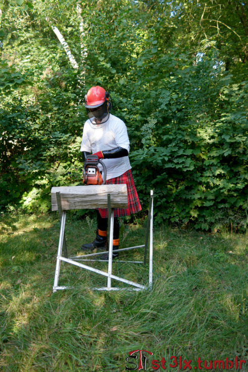 The Rubber Highland Games 2018 - Part 2 of 7Rubbered husband cutting wood in the garden
