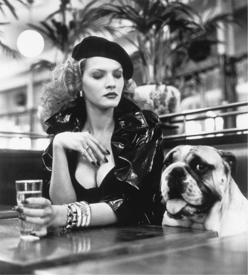well-la-de-fricken-da:omgnotpc:  lelaid:Shot by Helmut Newton for Pomellato, 1982The dog almost looks guilty of something  Lmao! He does! And she’s looking at him like “I know what you did” Ha!