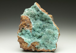 hematitehearts:  Cuprian Adamite on Goethite