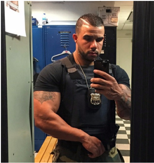 XXX gaybicops:  tattedsavage88:  HE CAN ARREST photo