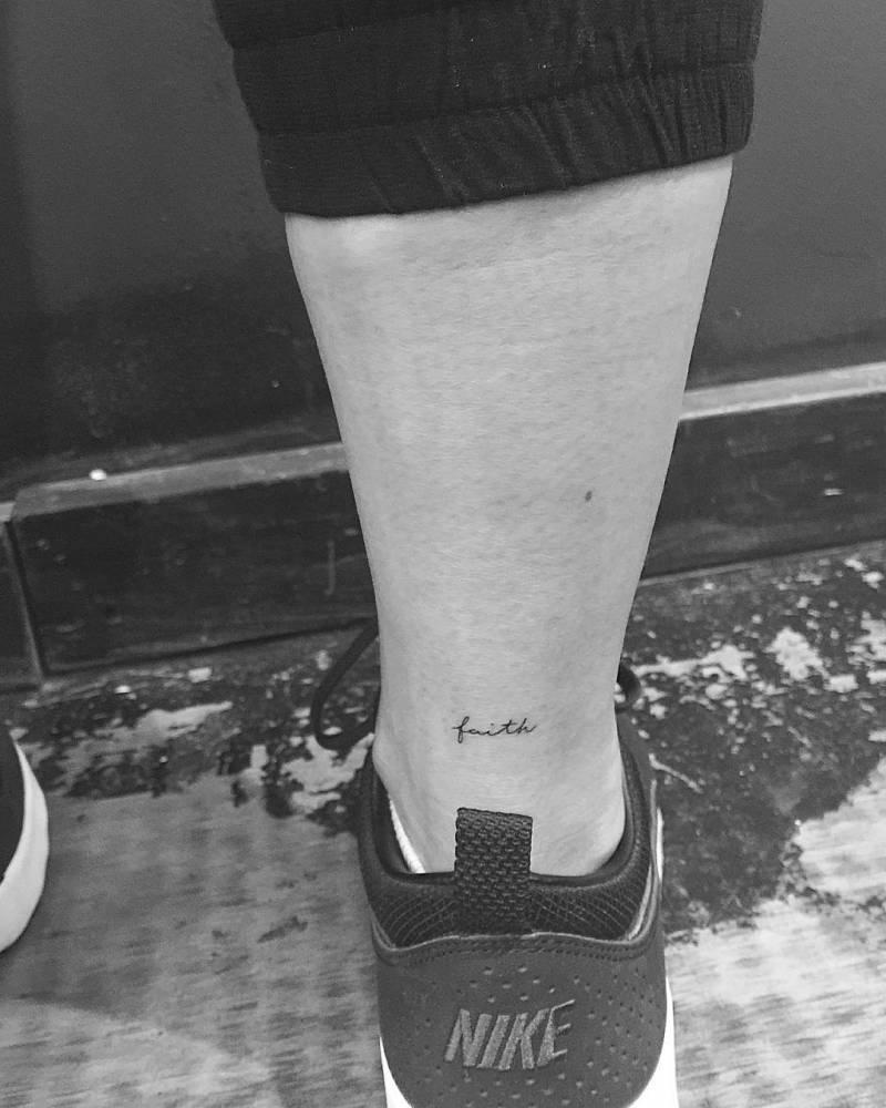 Love yourself tattoo on Achilles heel