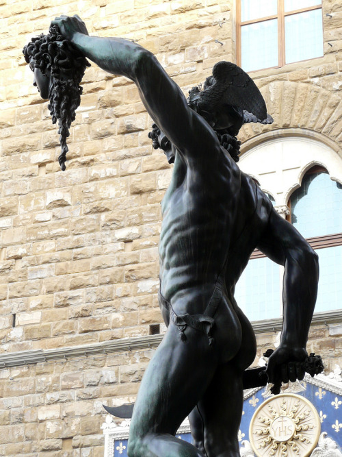 f-l-e-u-r-d-e-l-y-s:  Perseus with the Head of Medusa: Benvenuto Cellini -1554  Sculpture 3.20 m  on a square base with bronze relief panels is located in the Loggia dei Lanzi of the Piazza della Signoria in Florence, Italy. The subject matter of the