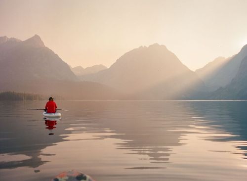 Golden hour paddle boarding on Leigh Lake in Grand Teton National Park. Shot on Kodak Porta 160 and 