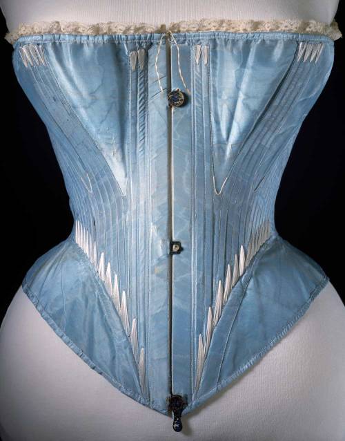 Corset (front view), blue silk stiffened with whalebone, possibly English or French, 1864, from the 