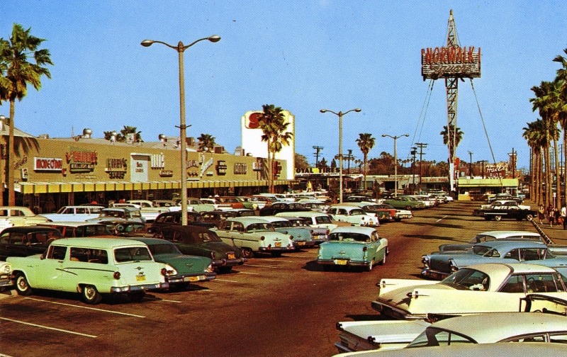 losangelespast:  Color picture postcard of Norwalk Square, its parking lot full of