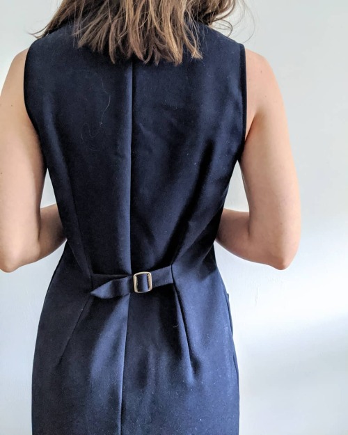 Work to Play . Description: 1980’s Knit Navy Sleeveless Button-Down Dress with Faux Pockets and Belt