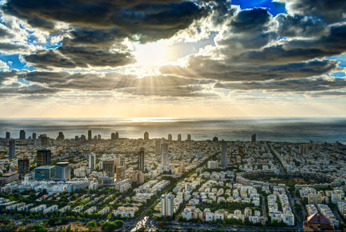 Glowing Rays by David Ayash Shot from the tallest point in the entire Middle East. The helipad on