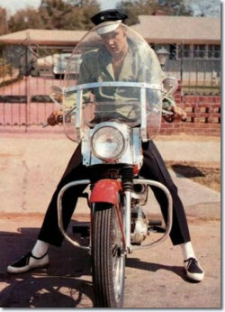 thespaceboyworld:  the man on his motorcycle