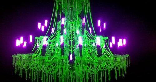 magicalandsomeweirdhometours: Uranium glass chandelier with black light bulbs.via gothic home decor 