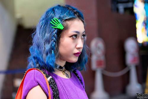 Blue hair & neon skeleton hand hair clip on the street in Harajuku.