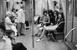 theunderestimator-2: Iconic photograph of The Ramones at the NYC subway in 1975 by Bob Gruen. Rumour has it that the old couple’s daughter once contacted Bob Gruen  and said: “Hey-those are my parents!”, immortalized through the Ramones.   “…I